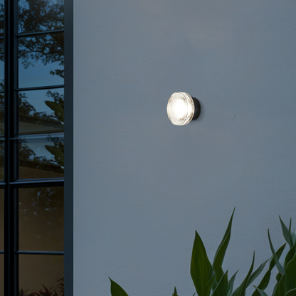 Embrace Modern Outdoor Wall Lamp - Clear Glass & Metal Round Design for Patio